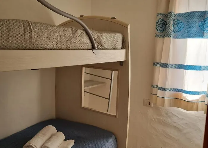 Casa de Férias Le Farfalle In Trifamiliare Porto Istana